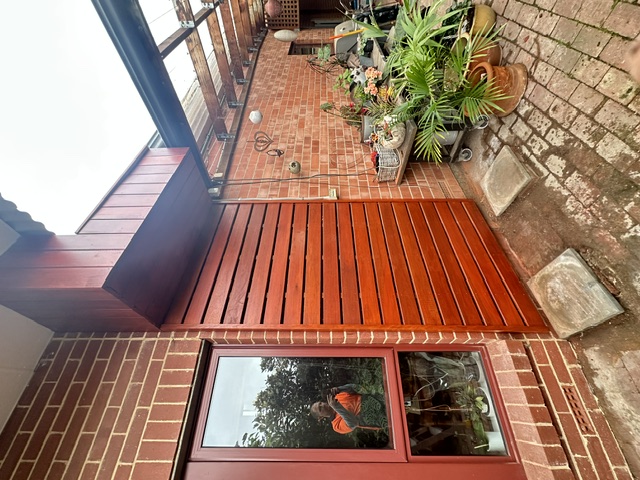 Finished timber slat cladding feature wall and door